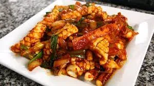 97. Sauteed squid in hot spicy sauce