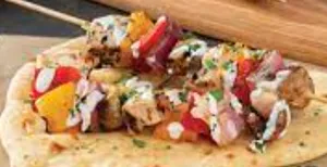 Cheesy Chicken Kebab with garlic naan