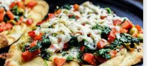 Cheese & spinach Naan with tomato sauce